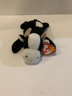 1994 Beanie Baby Daisy... Swing tag and Tush have errors and is made of PVC. Very rare. I couldn’t find any on eBay.