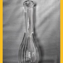 

Bud Vase CLG company Clear glass vertical ribbed and scalloped top, 8.75” high x 2.5 “ diameter-