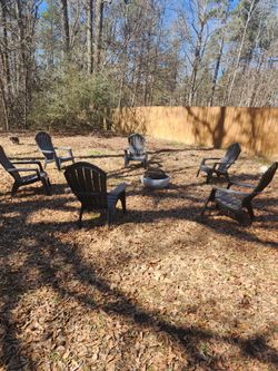 6 Black Aderondack Chairs And Fire Pit
