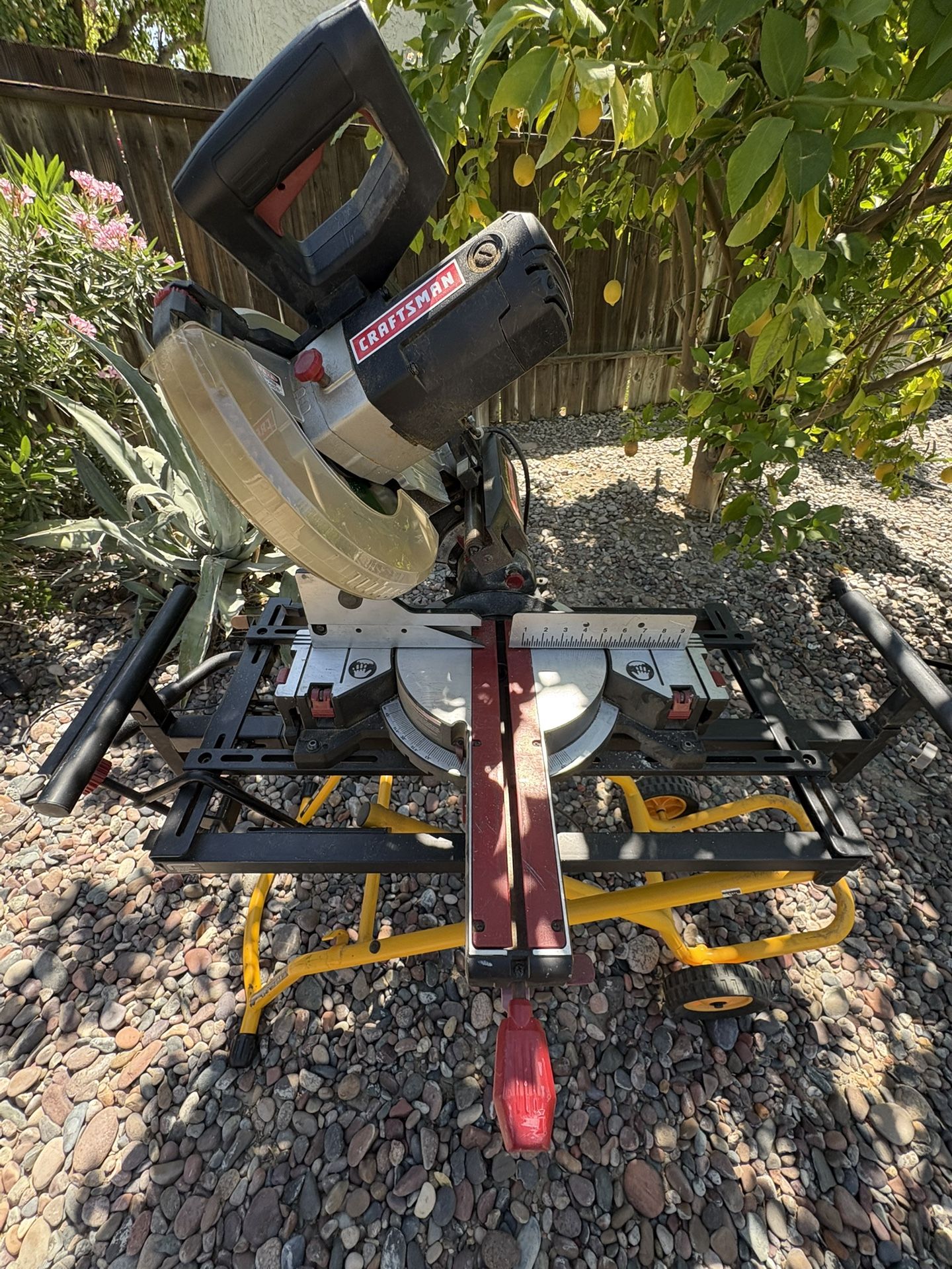 Craftsman Compound Mitre Saw On De Walt Rolling Folding Stand.