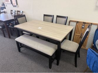 Dining table with 4 chairs and a bench