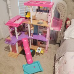 Barbie doll house with pool and elevator. 