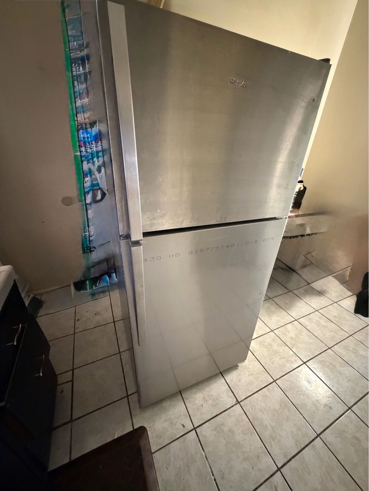Whirlpool 18 cubic foot refrigerator with 30 inch wide top freezer