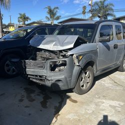 I'm selling a 2007 Honda Element. It was in a front-end collision, and the area around the radiator is damaged, but the engine is undamaged. After the