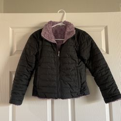 North face Child’s Reversable Jacket.  Purple and black