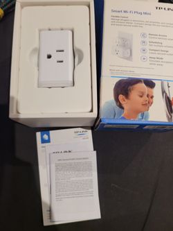 TP-Link Kasa Smart Wi-Fi Plug Mini (Model HS105). 