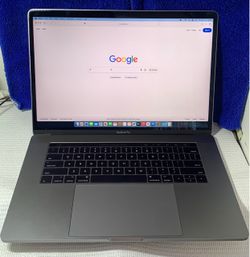 MACBOOK PRO WITH TOUCH BAR 15’
