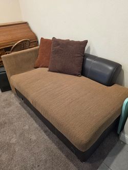 A piece of a sectional Couch