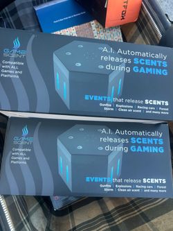 GameScent Automated game perfume atomizer, automatically releases fragrances associated with game events (gunshots, explosions, race, forest, ocean, c