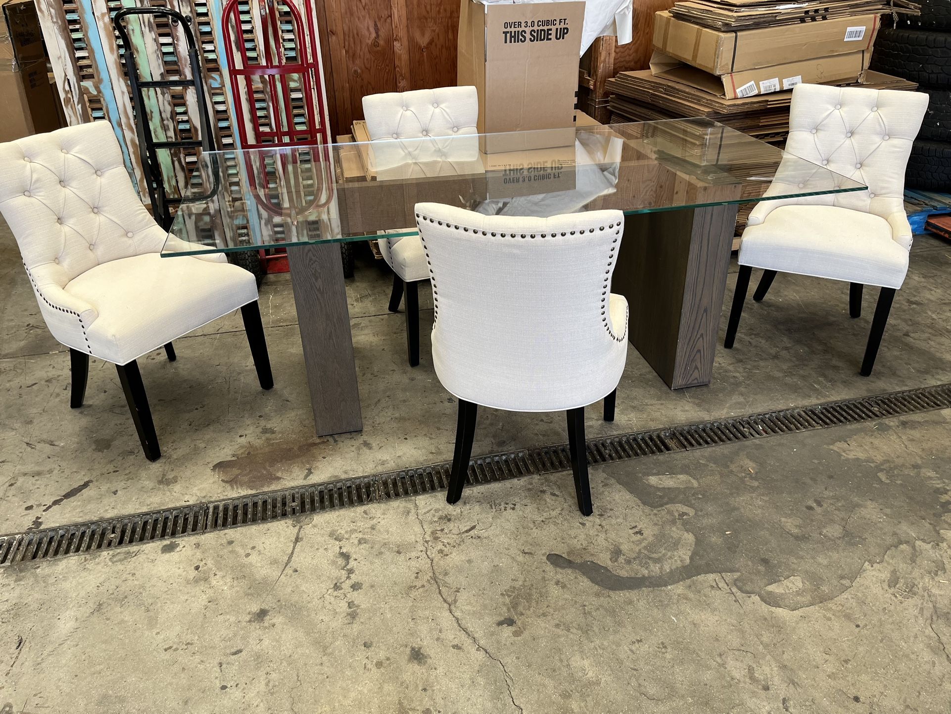 Elegant dining room table and four chair chairs
