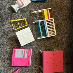 Barbie dolls boat emergency room helicopter airplane camper items and a car