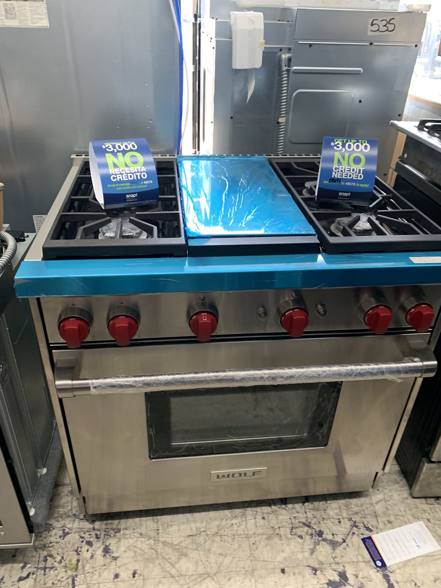 Wolf 36” slide in range with middle grill in stainless steel