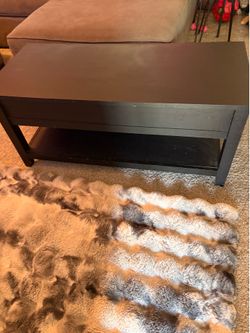 Coffee table with liftable top
