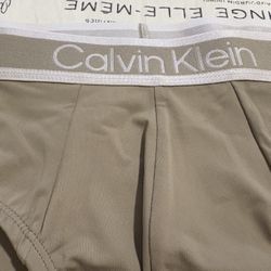 BRAND NEW Calvin Klein XL Beige Brief Underwear BRAND  NEW  (never used)  NO...YOU CAN NOT TRY THEM. But you can see them with any purchase compromise