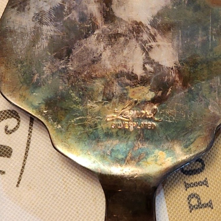 Leonard's Silver Pie Cutter