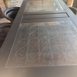 Table and equipales chairs