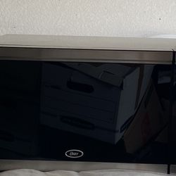 Microwave  Oster OGCMDM11S2-10