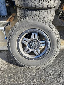 FUEL Anza, Graphite with Matte Black Ring (18x9) wheels with 33in General Graber A/T