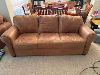 Leather couch, two sofa chairs, two ottoman