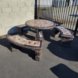 Water Fountains And Concrete Tables 