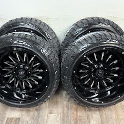 New 22x12 gloss black wheels wrapped in RBP 285/45r22 tires