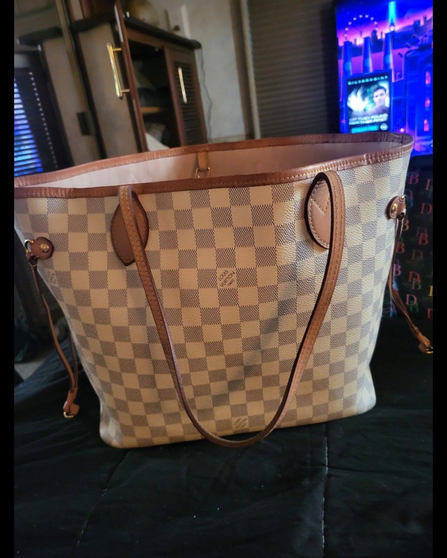 Original Louis Vuitton Handbag Never Full -Comes. With Tote/Clutch Wallet.  Medium Size Located On The Inside for Sale in Phoenix, AZ - OfferUp