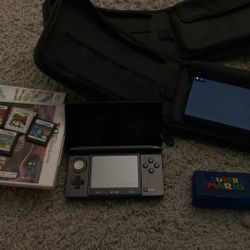 selling some ds and 3ds games and a black nintendo 3ds and a  blue nintendo dsi 