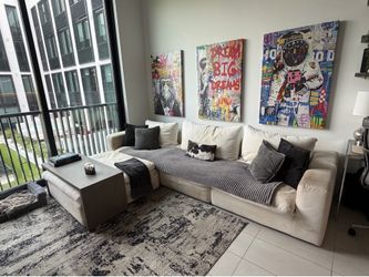 Large white sectional  sofa with ottoman for sale