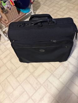 This Luggage is great. So many compartments. Pull up handle, wheels