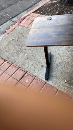 Brown height adjustable desk