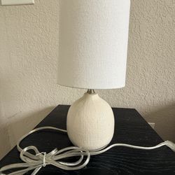 Modern white table lamp and White textured decorative vase