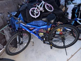 Different bicycles and a work out bike