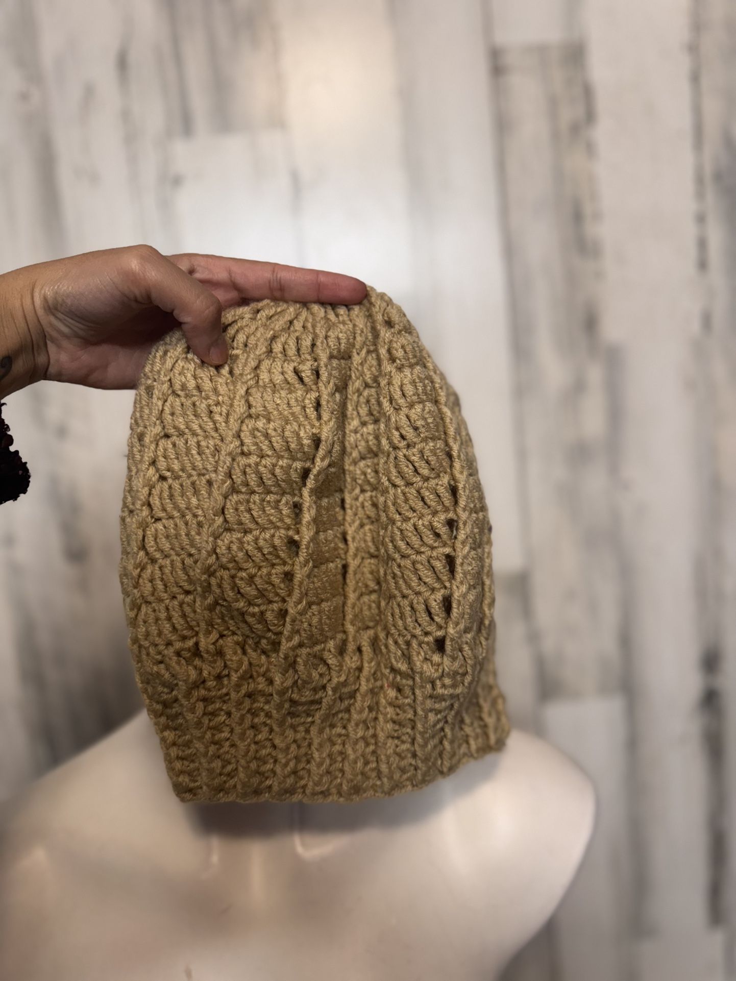 Woman’s brown crochet beanie
