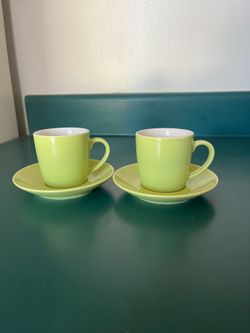 Small ceramic cups and saucers