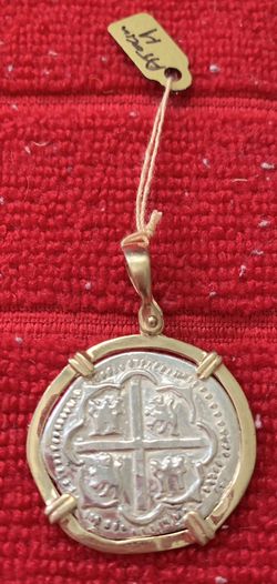 Atocha silver coin in gold bezel