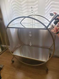 Mirrored Gold Bar on Wheels