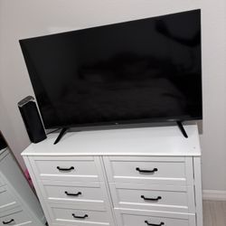 Dresser, TV, and Mirror