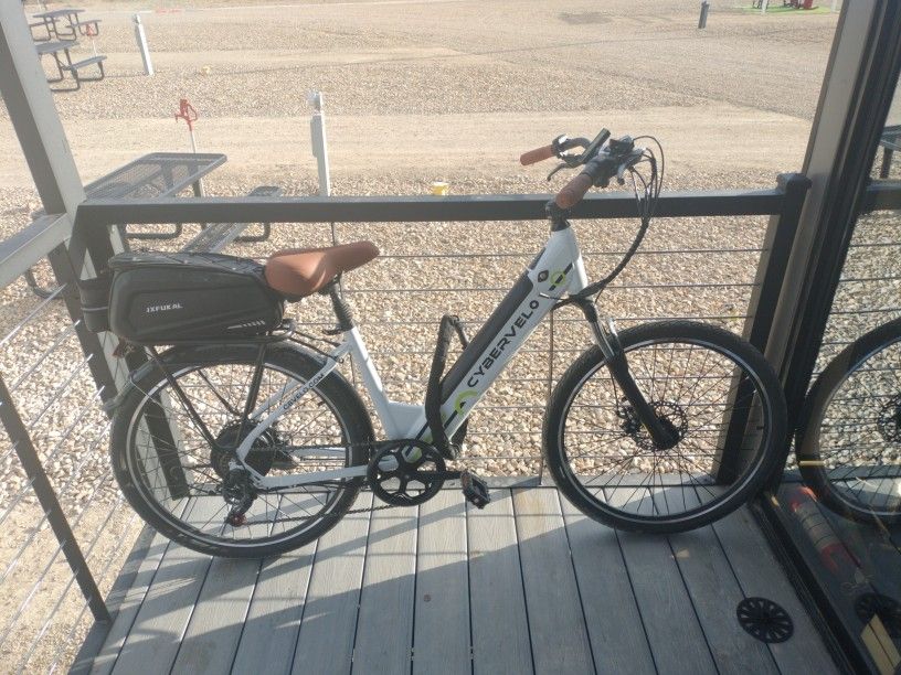 Basically Brand New Electric Bike.  Runs Perfect No Problems. Comes With Saddle Bag And Helmet And Heavy Duty Bike Lock.