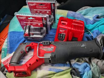 Milwaukee sawzall and batteries 5.0 and charger