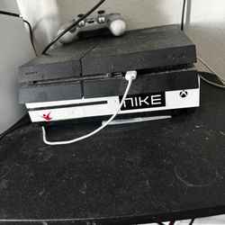A Ps4 With Controller 
