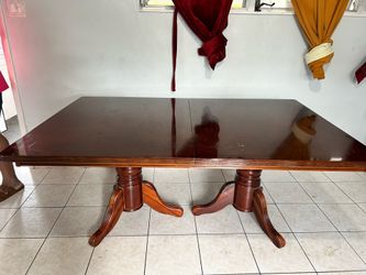 Wood dinning table seats up to 10