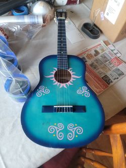 Blue acoustic guitar 🎸 💙  70 or best offer  or willing to trade