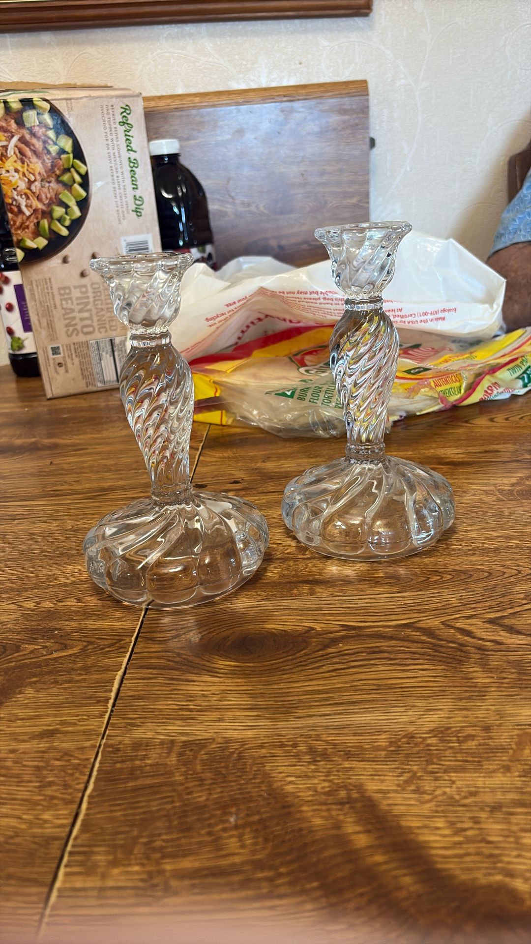 Two Glass Candle Holders With A Swirl Design