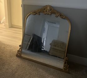 Large gold mirror