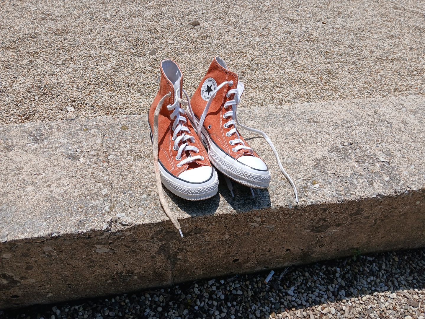 Chuck Taylor Converse size , men's 7 runs large burnt orange