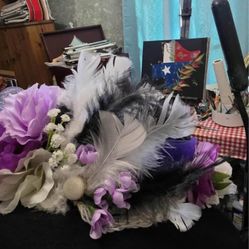 Ladies, black fascinator felt hat with purple shades if flowers feathers and ribbon