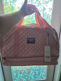 Pink quilted travel bag