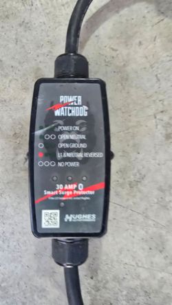 30 amp. Cord and smart protector for RV $130.00 OBO.