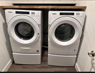 New washer and dryer with pedestals