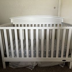 Crib, Changing Table And Mattress.